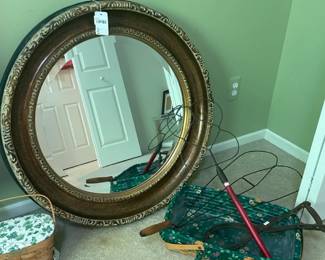 Ornate circular wall mirror