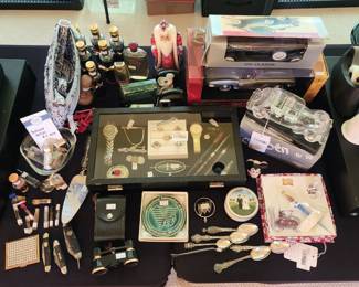 Villeroy and Boch married couple trinket box, Buick hood ornament, VTG opera glasses 2.5 x 24, 10K 1959 Class Ring, VTG Pal Cutlery Boy Scouts pocket knife, Murano Glass Pen and Ink Set, 10K class rings, 3 coin tie clip, Celluloid floral brooch, Hamilton watch, Seiko kinetic watch, Sterling tie clips, Buick Riviera hood ornament, Tuscany per donna .25, Estee Lauder Intuition perfume .14, Liz Claiborne triangle perfume 1/8, Estee Lauder Beautiful perfume 30ml, Estee Lauder Youth-Dew 2.25, Estee Lauder Youth-Dew 1.5, Vera Bradley perennial grey purse, American Muscle 1962 Corvette model car, Arcade Cast Oliver Tractor, Perfumes, Bejeweled makeup compact, Sterling handle cake server