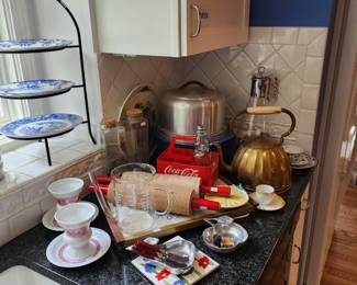 VTG Rolling Pins, Plastic Coke Carrier, Cake Plate Stand, Antique Brass/Copper Kettle, Teacups and Saucers