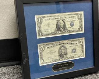 Framed one and five dollar silver certificates