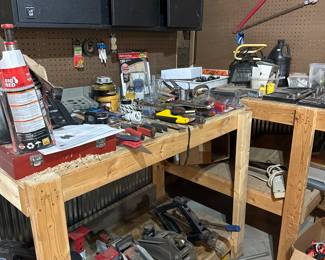 tool bench with lots of misc tools 
