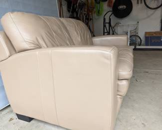 Light Brown Leather LoveSeat. Good Condition and comforatable. Asking $85 or OBO.