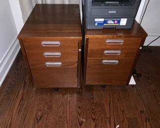 2 IKEA filing cabinets.  Part of IKEA desk set.  Asking $150 for all pieces including desk, filing cabinets and books shelves. 