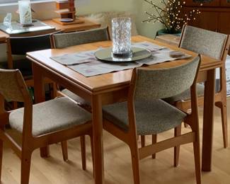 BUY IT NOW: MCM Danish Teak Expandable Dining table and chairs. Made in Denmark. Table size when extended measures 63.5 x 35.25 but is 35.25 square when not extended. Prices on Charish for same table no chairs is $2500.  Asking $400 for table and 4 chairs. 