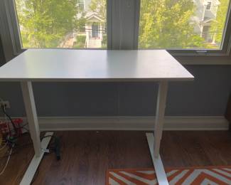 BUY IT NOW: IKEA White Standing Desk.  Rolls up and down manually with a crank.  Originally $369. Asking $85 or OBO.  Have 2 for purchase.