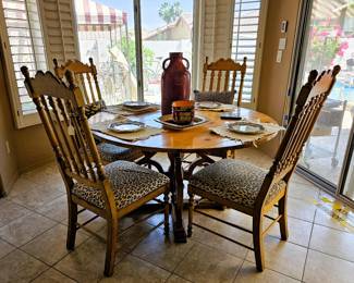 Cheetah print chairs and dining table set