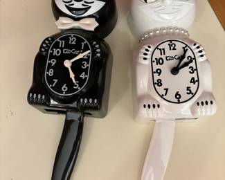 Black & White Kit Cat Clocks 
