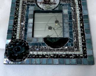 Handmade glass and ceramic mirror , one of a kind . 