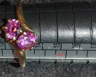 Vintage amethyst 10 karat gold ring size 6 ( looks more pink on the light) 