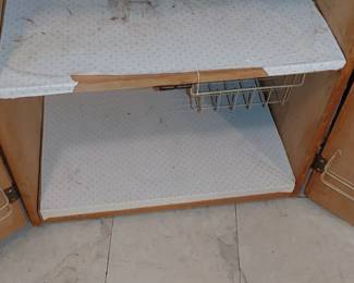 Nice butcher block cabinet with slide out cutting boards one side for knives one side for utensils opens up has nice storage and storage racks on the inside of the doors