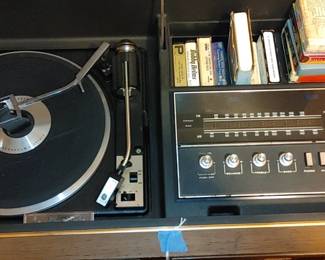 GE cabinet stereo it's turntable AM/FM and 8-track player works