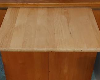 Nice butcher block cabinet with slide out cutting boards one side for knives one side for utensils opens up has nice storage and storage racks on the inside of the doors