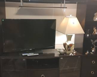 Large modern entertainment center would fit huge flat screen TV