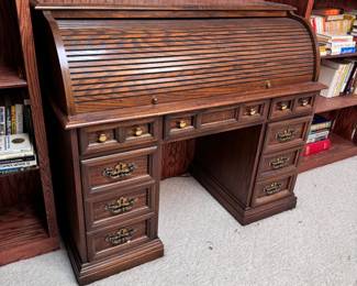 Rolltop desk, good used condition, some scratches & spots, 40"H x 52"W x 23"D (This item is in the Lower Level, HEAVY, & must be carried up a hill by buyer's movers) 