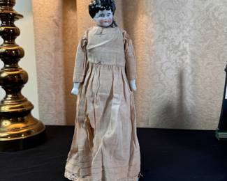 German head-shoulder doll dress and porcelain shows wear and tear and has been glued 12"H