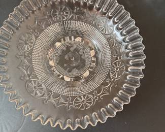 Vintage pressed glass tri-foot dish with beaded center and ruffled edge 8"