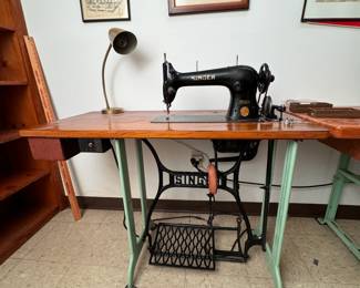 Vintage Singer professional tailor's sewing machine with treadle speed adjustment, works well on initial test 29"H x 5'3"W x 19"D (This item is heavy & downstairs)