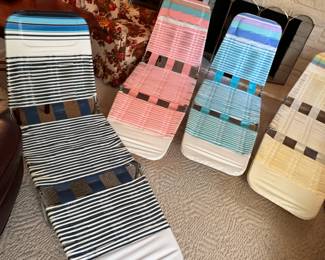Set of woven plastic vintage lounge chairs, each end adjusts easily (Not tested for strength, appear in good condition with some oxidation seen)