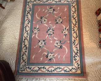 Emir rose pink polypropylene fringed area rug, has some spots and needs cleaning 4' x 6'