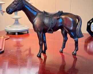Ceramic horse figurine with metal-like finish, backleg has been repaired 7"H