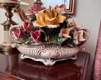 Monumental Capodimonte porcelain floral arrangement has a minor chip on one leaf,  11"H x 15"W