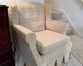 Wing back chair with circle-pattern upholstery, some wear to cover, original fabric is brown plaid 34"H x 34"D x 32"W (This item is heavy & downstairs)