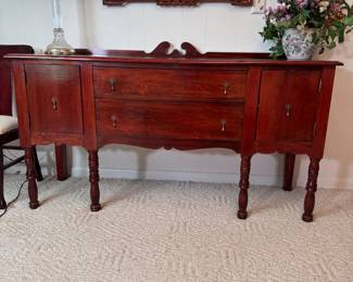 Server with two drawers and side cupboards, drop pulls, minor stain inside top drawer, old refinish, nice condition 35"H x 68"W x 21"D