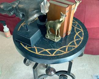 Interesting small round iron leg table