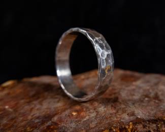 Artisan made hammered sterling silver ring, made by artist in Mexico City. Total approx. weight is 4.84 grams and size 11.5.