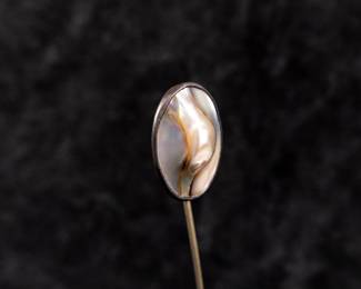 Sterling silver stick pin with blister pearl. Total approx. weight is 1.96 grams and measures 2.5'' long.