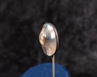 Sterling silver stick pin with blister pearl. Total approx. weight is 1.96 grams and measures 2.5'' long.
