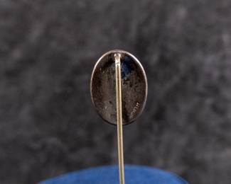 Sterling silver stick pin with blister pearl. Total approx. weight is 1.96 grams and measures 2.5'' long.