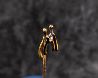 14kt gold stick pin, wishbones with a small seed pearl. Approx. weight is 1.56 grams and measures 3'' long.