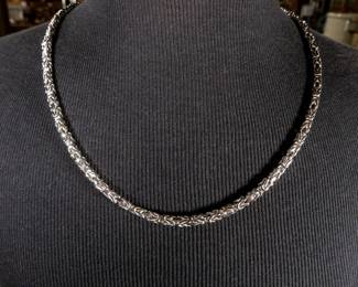 Byzantine link sterling silver Italian chain in like-new condition. Measures 28'' with a total approx. weight of 104 grams.