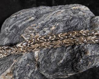 Byzantine link sterling silver Italian chain in like-new condition. Measures 28'' with a total approx. weight of 104 grams.