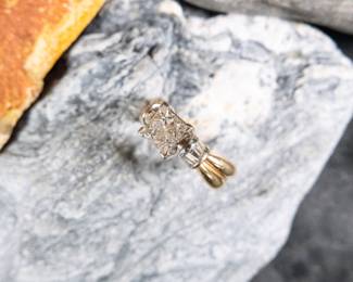 14kt gold diamond ring with over 1ct of real diamonds. Makers mark "LID" with an total approx. weight of 7.34 grams. Size 7.5.