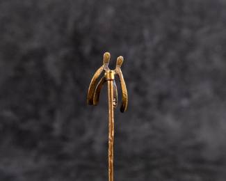 14kt gold stick pin, wishbones with a small seed pearl. Approx. weight is 1.56 grams and measures 3'' long.