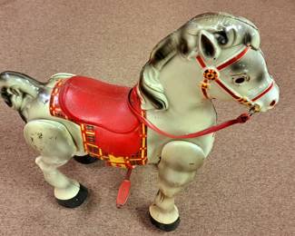 "Mobo" riding bronco pedal horse