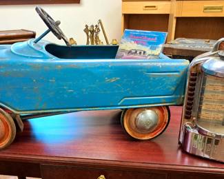 1950's and 60's items. Murray Tee Bird pedal car and Rock-ola jukebox coin operated wall box