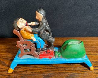 Cast Iron Mechanical Dentist Piggy Bank