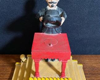 Cast Iron Magician Mechanical Piggy Bank