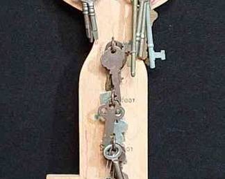 Antique Key Collection On Wooden Key Rack
