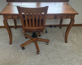 Wooden desk with 2 drawers and a chair. 29 x 54 x 27
