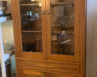 China cabinet. Has upper shelves, 2 drawers and bottom storage. 80 x 34 x 15