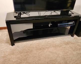 Black metal & glass TV stand 22 x 59 x 20 (located on lower level-has walkout) TV and components not included