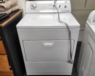 Whirlpool dryer works (located on lower level-has access to garage)