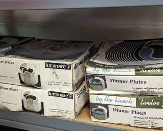 Plates new in boxes