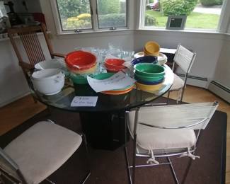 Glass-topped Kitchen Table with 6 chairs, table pad included.
