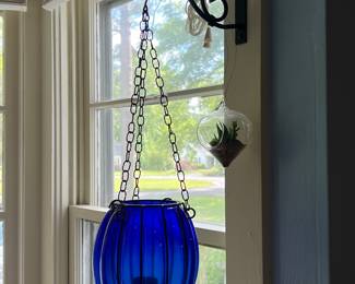 Hanging glass plant container 