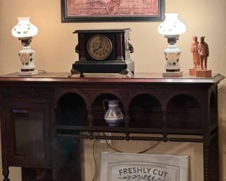 Antique bar back (section),  vintage lamps and mantel clock, hand carved wooden figures, decorative accessories
